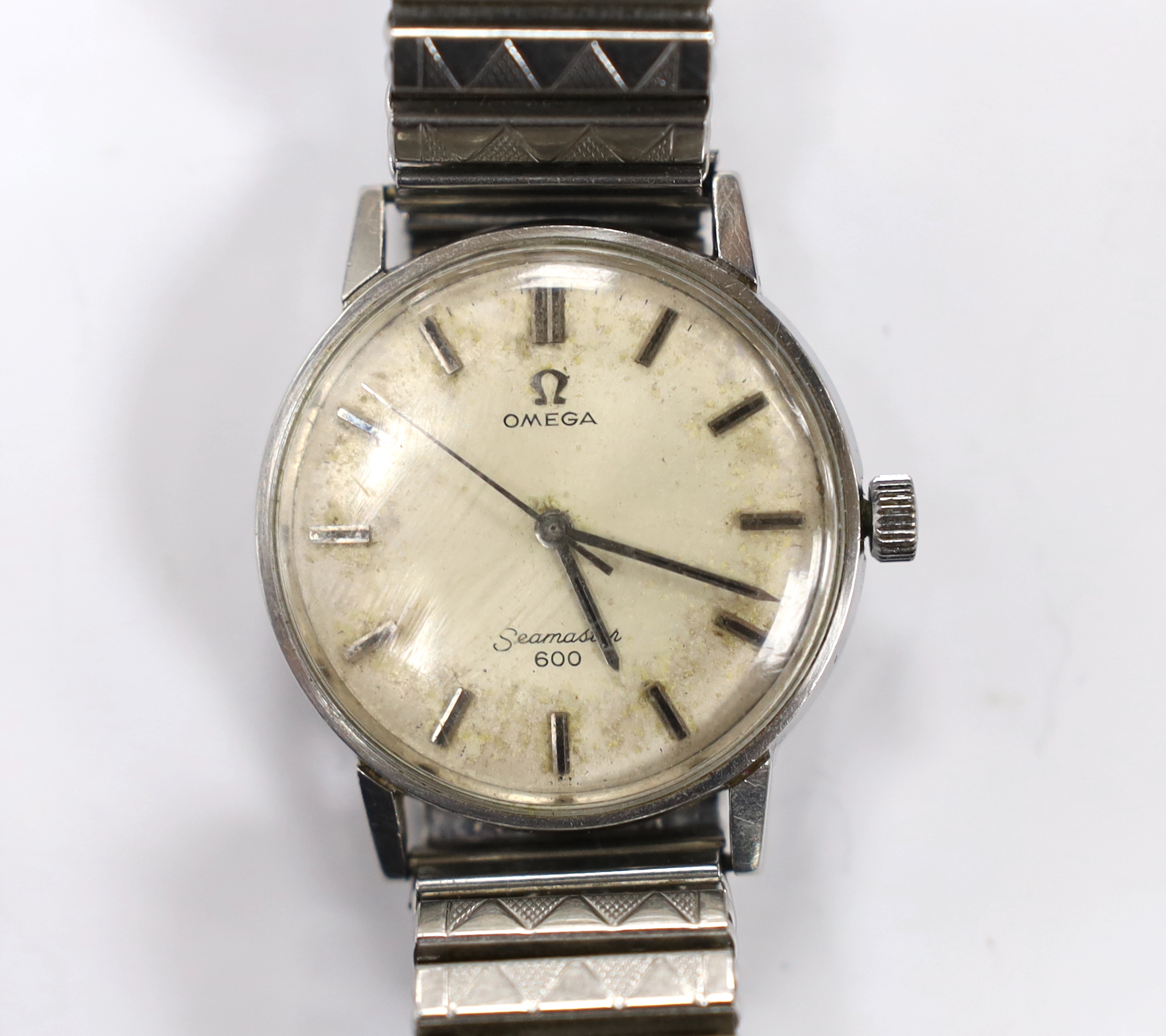 A gentleman's stainless steel Omega Seamaster 600 manual wind wrist watch, on associated flexible strap, case diameter 35mm.